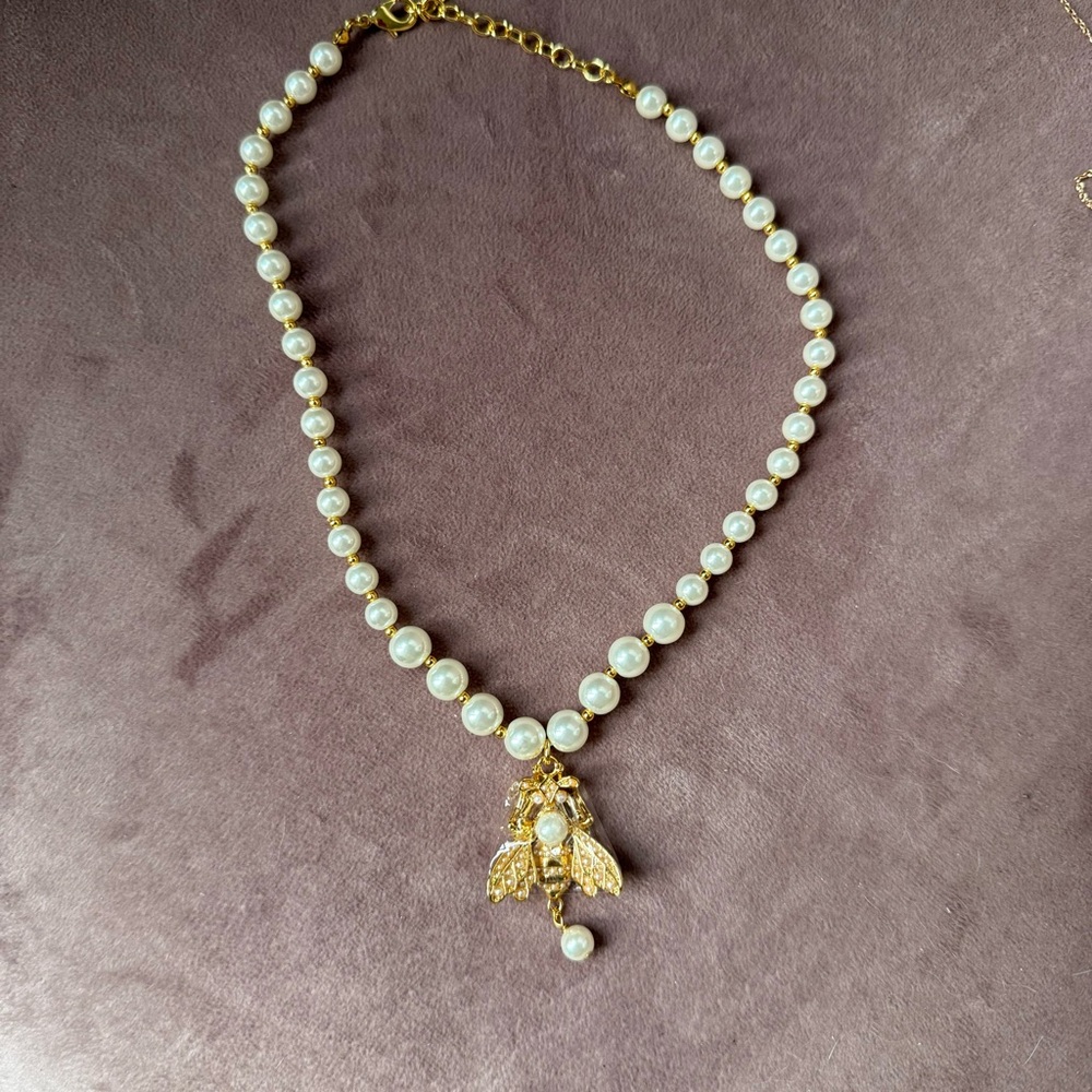 Elegant Gold and Pearl Necklace with Embellished Bee Charm